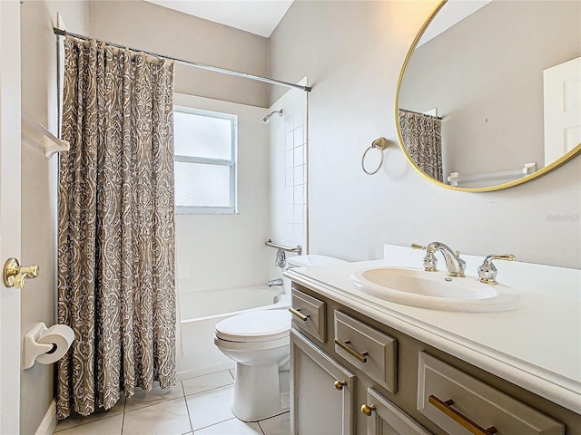 full bathroom featuring toilet, vanity, tile patterned floors, and shower / bath combination with curtain