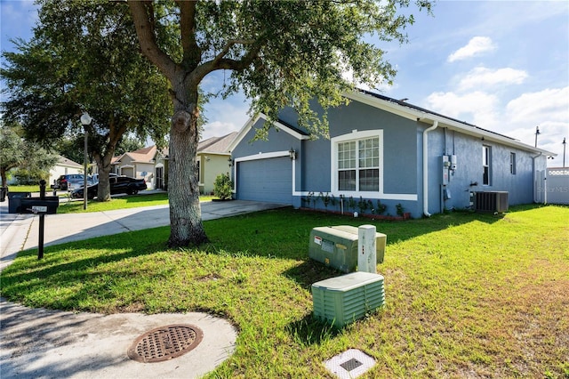 view of property exterior featuring a lawn, central AC, and a garage