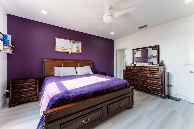 bedroom featuring ceiling fan and light hardwood / wood-style floors