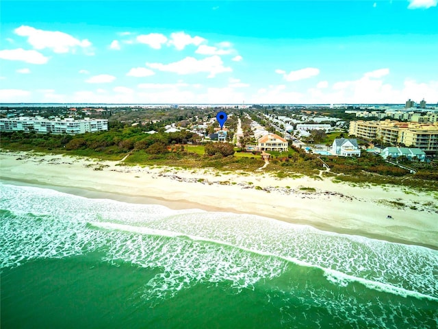 aerial view featuring a view of the beach and a water view