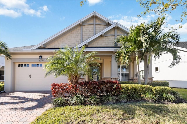 craftsman house with a garage