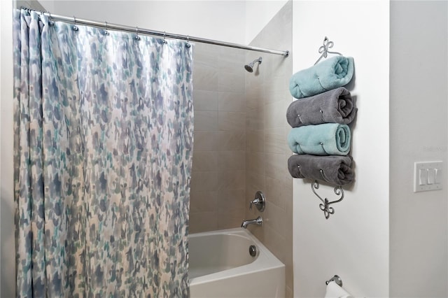 bathroom with shower / tub combo