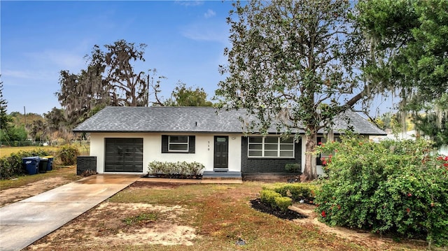 single story home with a garage