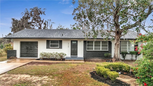 single story home with a garage