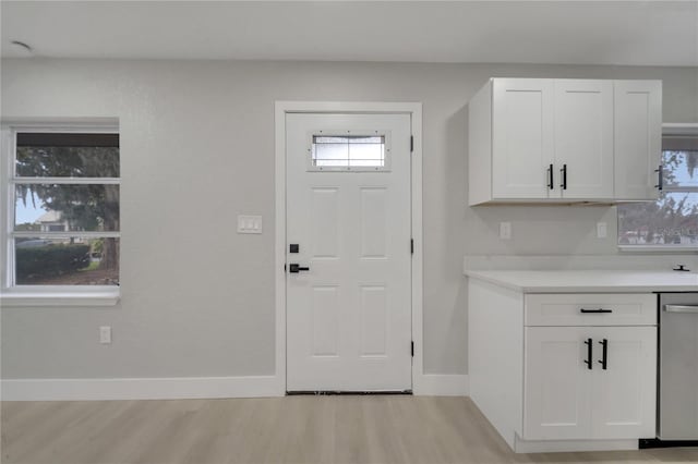 entrance foyer with light hardwood / wood-style floors