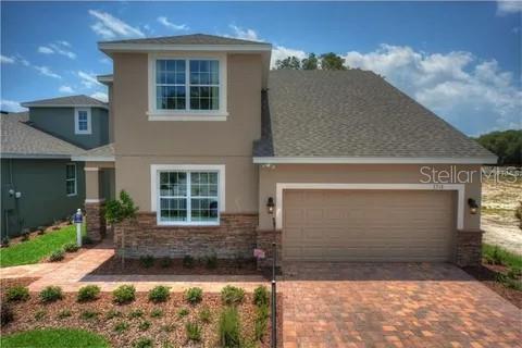 front facade with a garage