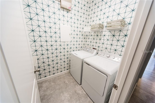 laundry room featuring washing machine and dryer