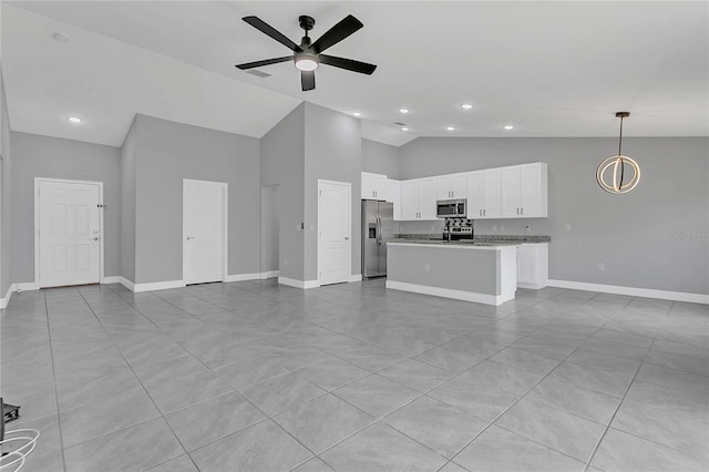 unfurnished living room featuring ceiling fan and high vaulted ceiling