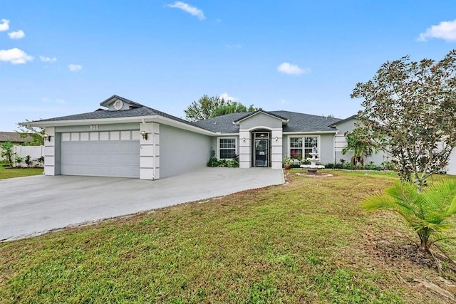 ranch-style house featuring a front yard and a garage