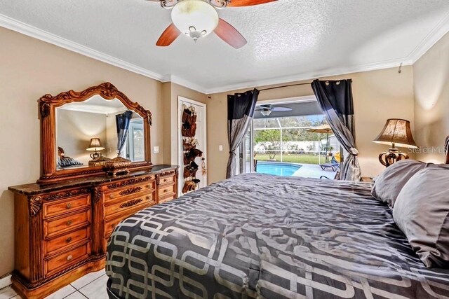 bedroom with access to outside, ceiling fan, light tile patterned floors, a textured ceiling, and ornamental molding