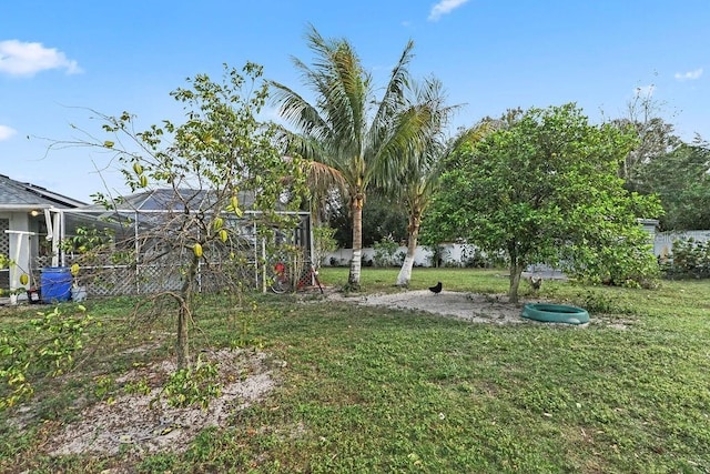 view of yard featuring a lanai