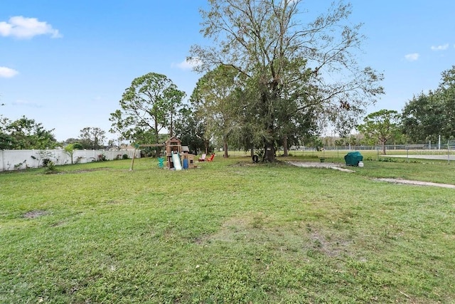 view of yard with a playground