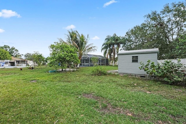 view of yard featuring glass enclosure