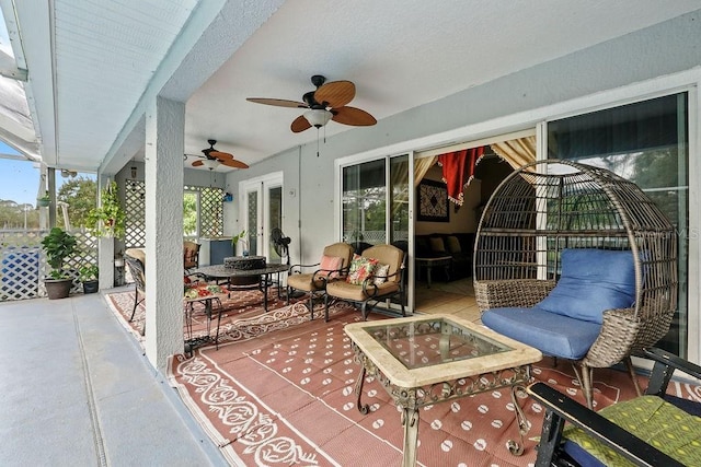 view of patio featuring ceiling fan