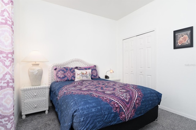 carpeted bedroom with a closet