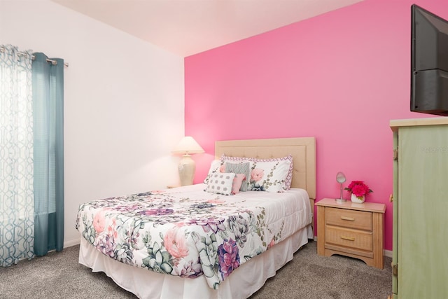 bedroom featuring light colored carpet