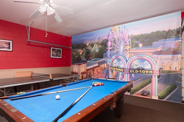 playroom featuring ceiling fan, a textured ceiling, and billiards