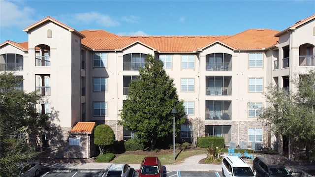 view of building exterior featuring central AC