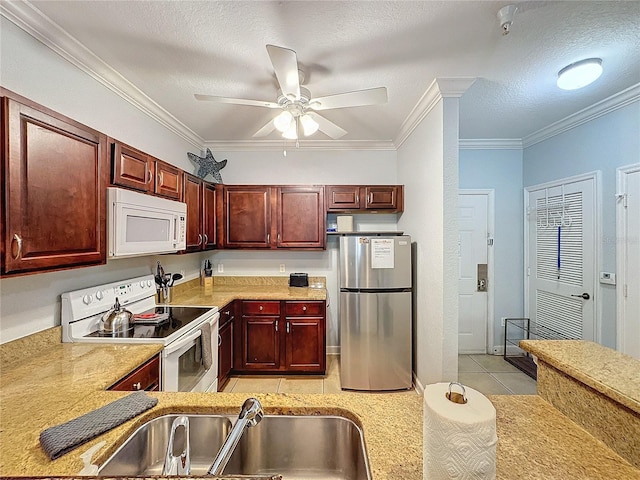 kitchen with white appliances, sink, ornamental molding, a textured ceiling, and light tile patterned flooring