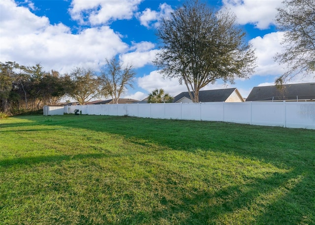 view of yard with fence