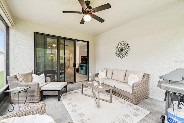 living room with ceiling fan