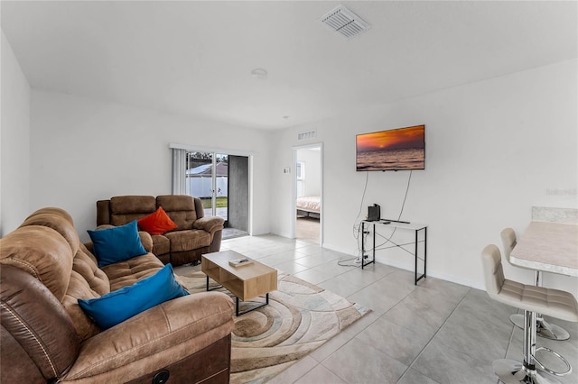 living room featuring light tile patterned flooring