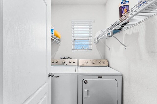 laundry area featuring separate washer and dryer