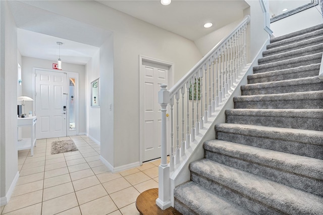 entrance foyer featuring light tile patterned flooring