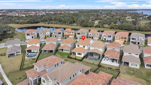 bird's eye view with a water view