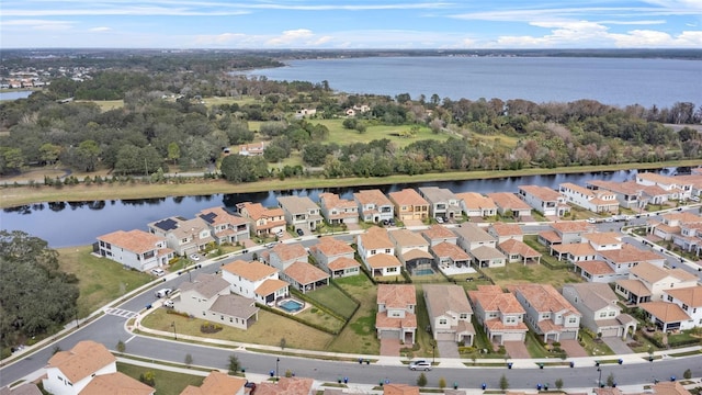 bird's eye view with a water view