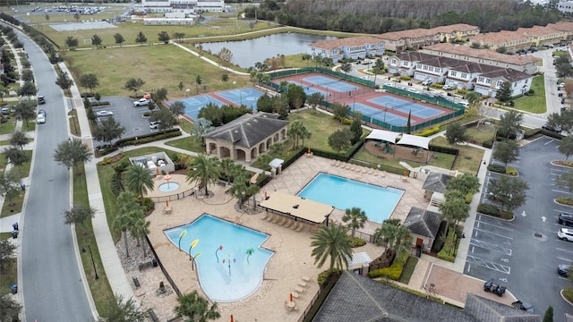 bird's eye view with a water view