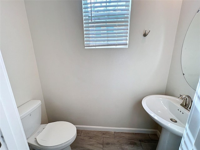 bathroom with sink and toilet