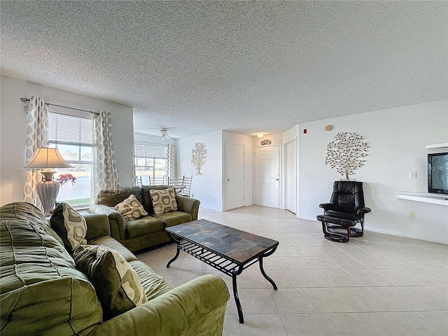 tiled living room with a textured ceiling