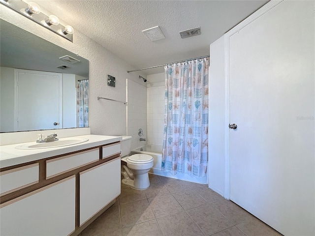 full bathroom featuring shower / bathtub combination with curtain, tile patterned floors, a textured ceiling, toilet, and vanity