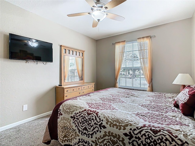 bedroom featuring ceiling fan and carpet floors