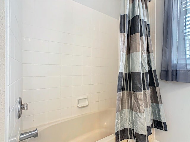 bathroom featuring shower / bath combo