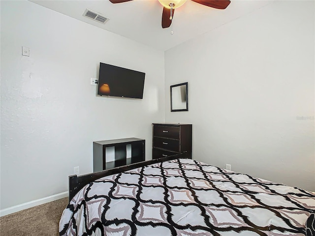 bedroom with ceiling fan and carpet floors