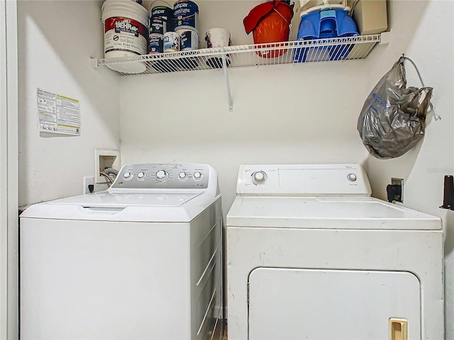 washroom featuring washer and dryer