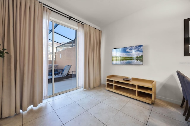 doorway to outside featuring light tile patterned floors