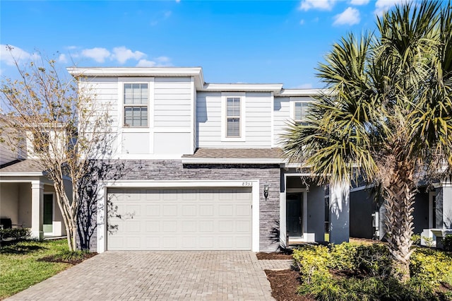 view of front of house with a garage