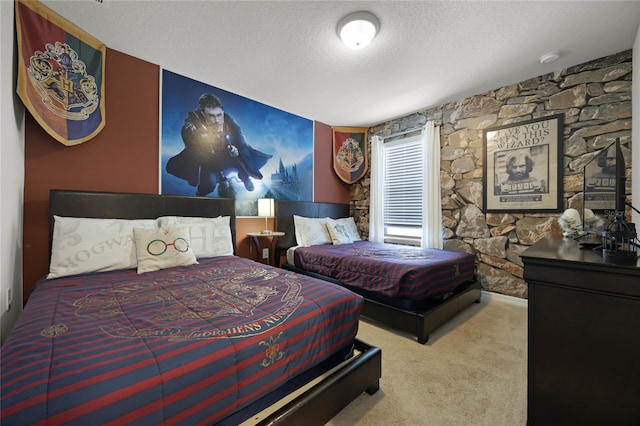 carpeted bedroom with a textured ceiling