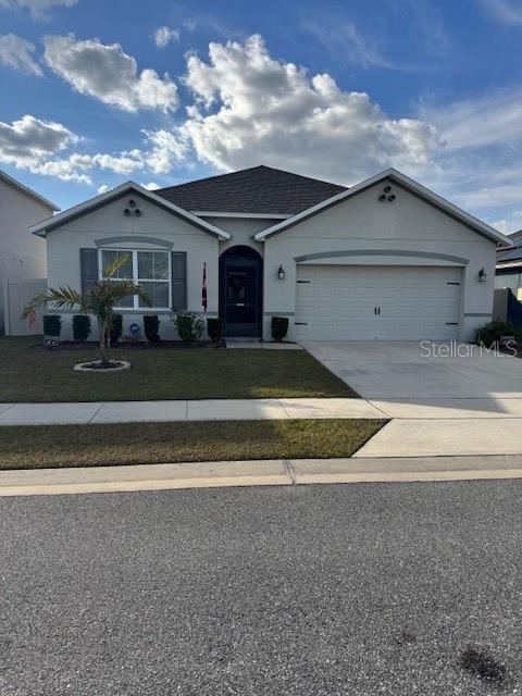 single story home with a garage