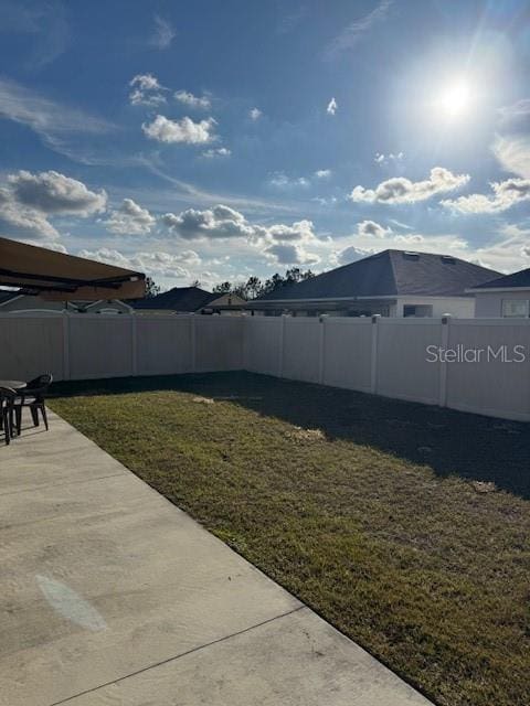 view of yard with a patio area