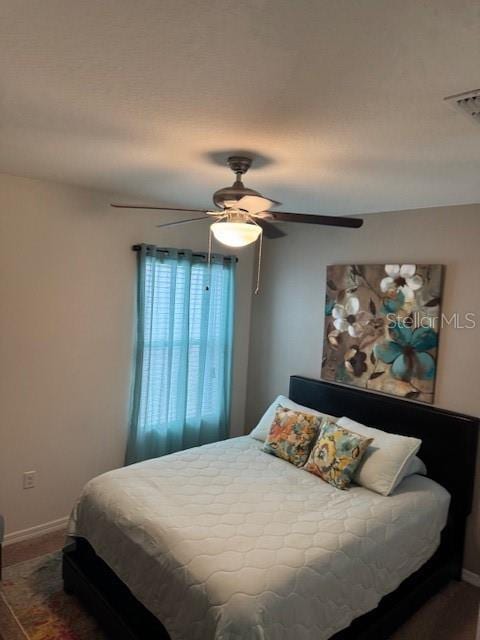 bedroom featuring ceiling fan