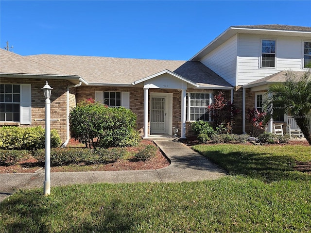 view of front of house with a front lawn