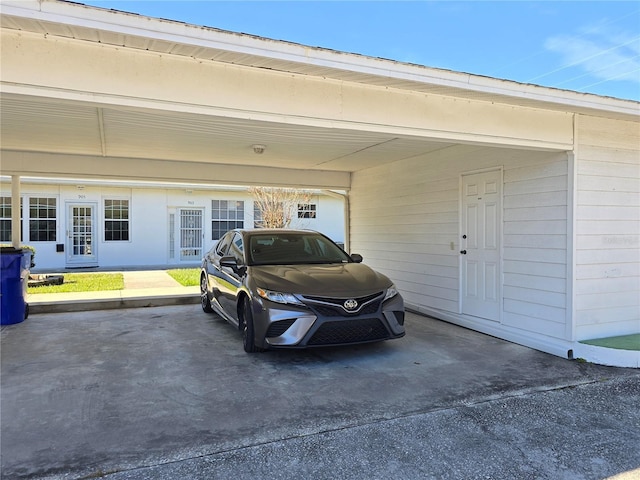 garage with a carport