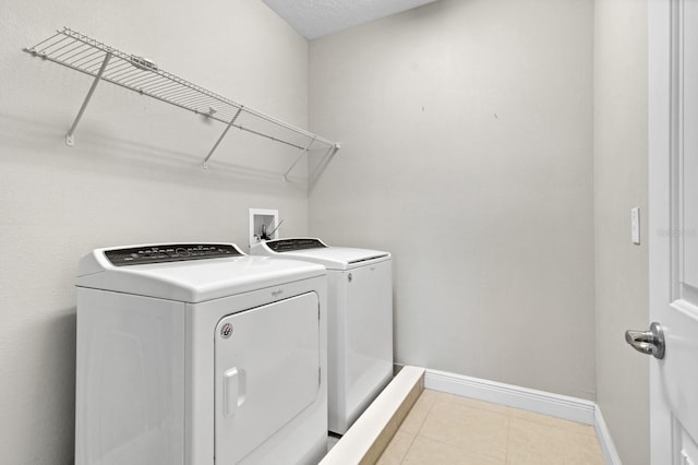 laundry room featuring washing machine and dryer