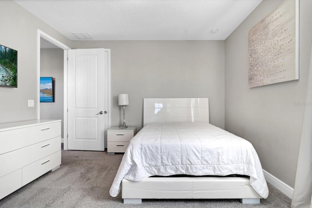 bedroom featuring carpet flooring