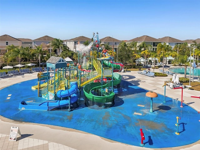 view of home's community with a playground