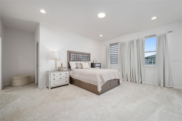 bedroom with light colored carpet